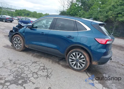 2020 Ford Escape Titanium z USA, uszkodzony, nr VIN 1FMCU9J92LUC16654